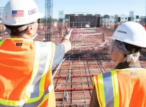 Construction worker mentoring retention representing 4 Strategies to Reduce New Hire Turnover Rate in Construction